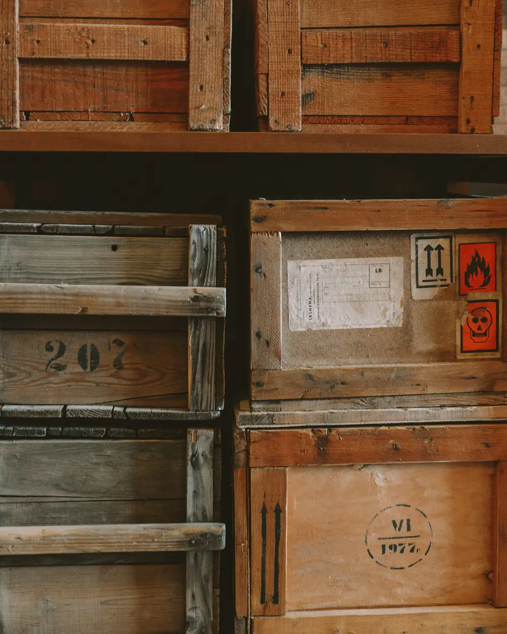 Stacked wooden export crates with stencilled markings