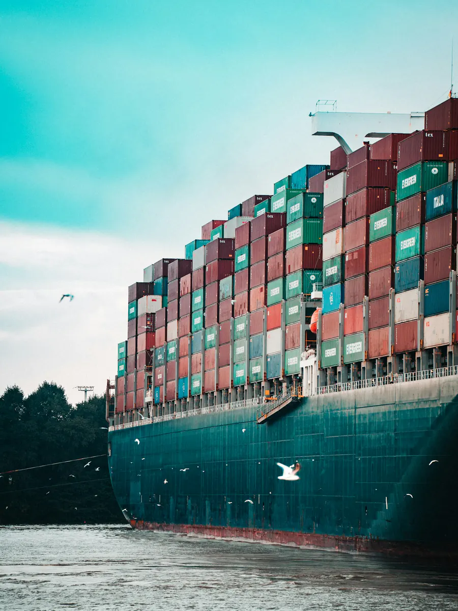 Bow of a loaded container ship leaving port